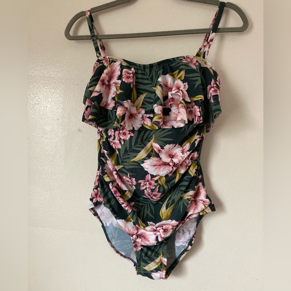 Floral swimsuit with removable straps.